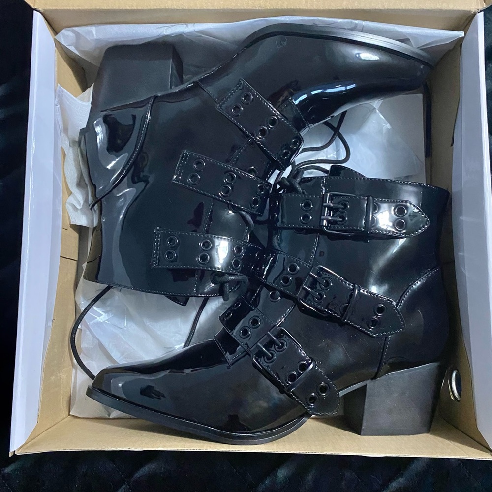 YRU Aura Strapped Blackout Patent Ankle Boots